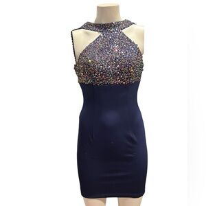 Sherri Hill Navy and Jewel-Toned Prom Dress. Beautiful beaded dress